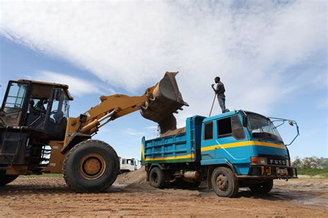 As sand miners prosper in Uganda, a vital lake basin suffers